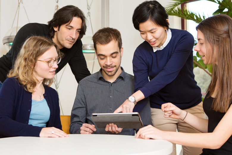 A group of students discussing at a table